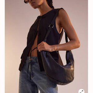 NEW FREE PEOPLE %100 leather idle hands leather sling bag